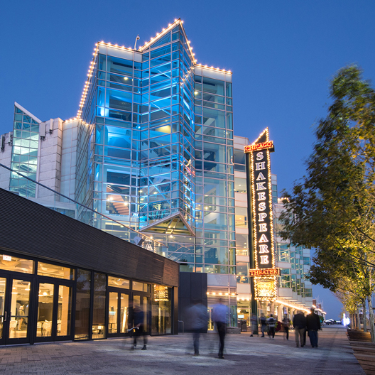 Exterior of Chicago Shakespeare Theater building on Navy Pier at dusk.