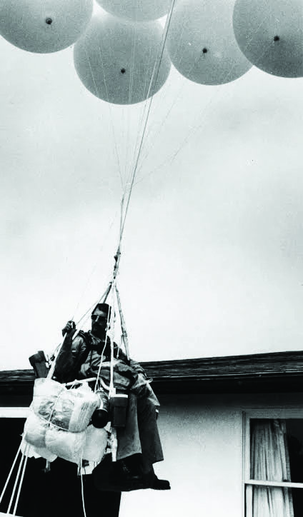 Actual archival photo from 1982 of Larry Walters pre-flight in his lawnchair tied to weather balloons Actual archival photo from 1982 of Larry Walters pre-flight in his lawnchair tied to weather balloons