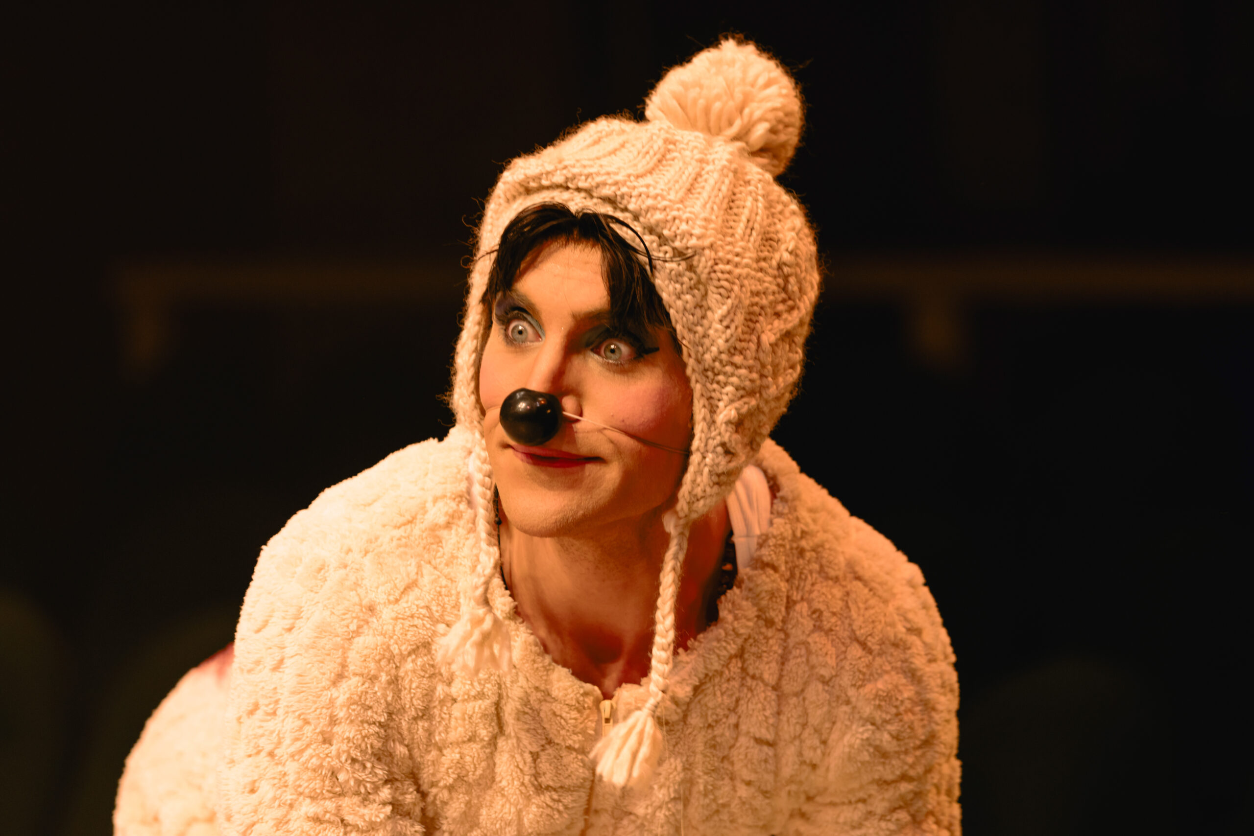 an actor dressed as a sheep